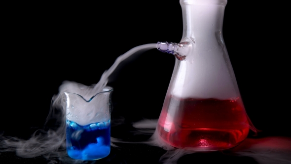 Test Tubes with Chemical Liquid in Laboratory,on a Black Background alt