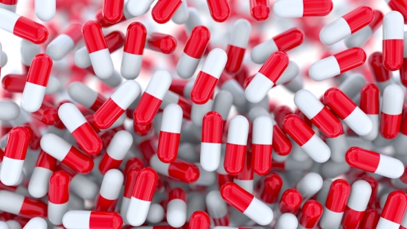 Falling Drug Capsules or Pills, Shallow Focus alt