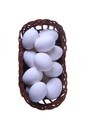 Eggs in a straw basket top view isolated - PhotoDune Item for Sale
