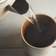 Filling Coffee in a Ceramic Cup with Hot Water From a Kettle - VideoHive Item for Sale
