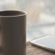 Ceramic Cup, Mobile Phone on a Window Sill Against a Window with Rain Drops - VideoHive Item for Sale
