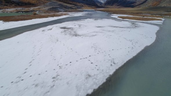 Aerial. River Running Through White Mountains Valley