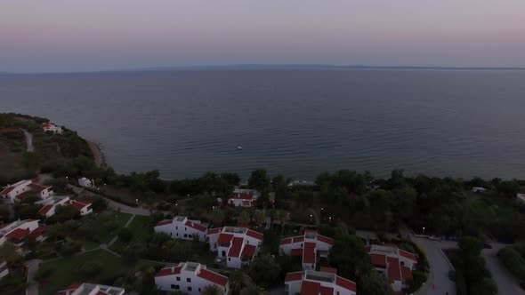 Aerial Scene of Sea and Cottages on the Shore. Trikorfo Beach, Greece