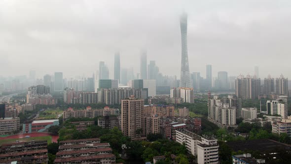 Guangzhou Aerial Cityscape Rain Clouds Timelapse Pan Up