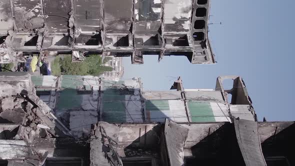 Vertical Video of the Consequences of the War in Ukraine  a Destroyed Building