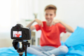 camera recording video of blogger boy at home - PhotoDune Item for Sale