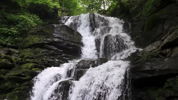 Green Waterfall River Rocks Covered with Green Moss Forest Waterfall