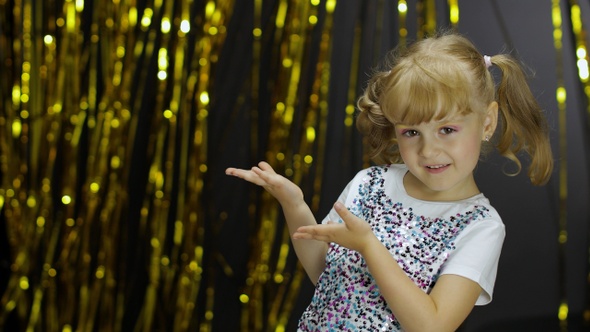 Child Showing Side Advertising Area, Looking Shocked, Pointing at Your Promotional Text, Logo