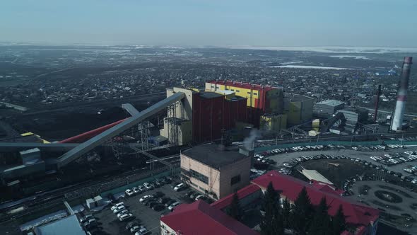 Factory for Processing Coal on Background of City