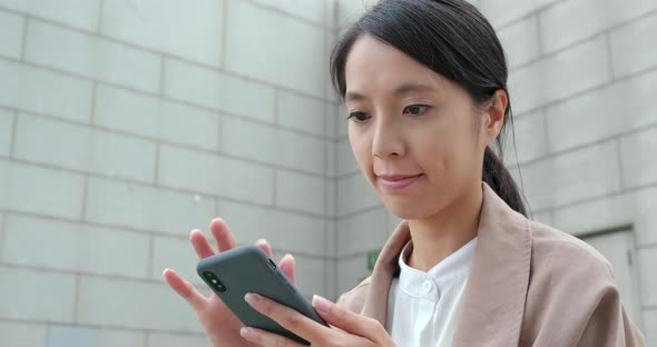 Business woman work on smart phone