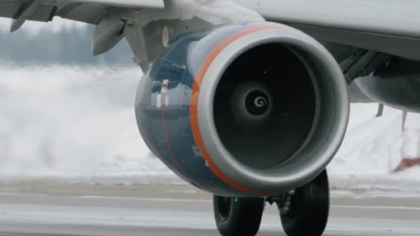 Jet Plane on a Snowy Runway 1