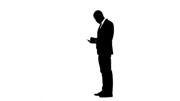 Businessman in the Phone Prints a Message. White Background. Silhouette
