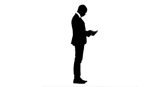 Businessman in the Phone Prints a Message. White Background. Silhouette