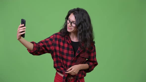 Young Beautiful Businesswoman Showing Phone