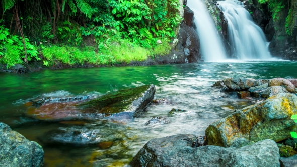 Waterfall in Deep Rain Forest Jungle in Bali, Indonesia