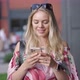 Young Woman Using Smartphone on Street - VideoHive Item for Sale
