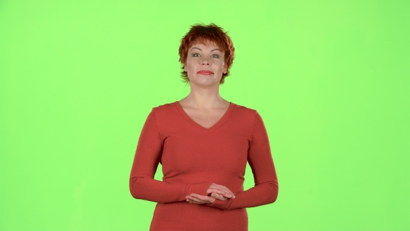 Woman in the Theater Claps Bravely To the Actors. Green Screen