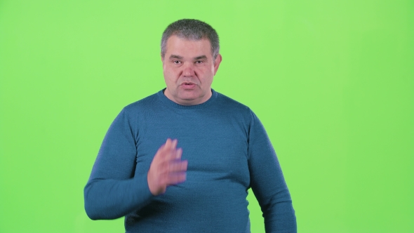 Man Talks About His Company and Its Achievements. Green Screen