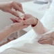 Close up of Nurse Administering Medications to Female Senior Patient - VideoHive Item for Sale