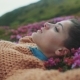 of Gorgeous Young Woman Lying Down in Violet Flowers, Enjoying the Moment Freshness, Aroma - VideoHive Item for Sale