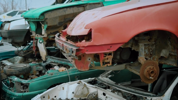 Rusty Broken Cars. Stacks of Old Broken Cars Without Details on Recycling Junkyard alt