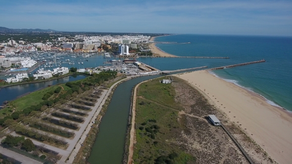 Aerial. Shooting a Video From the Sky with the Drone of a Tourist Town Vilamoura. Algarve