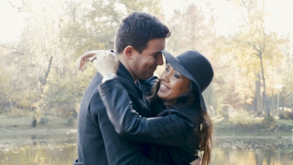 Happy Couple Having Good Time and Walking in Autumn Park