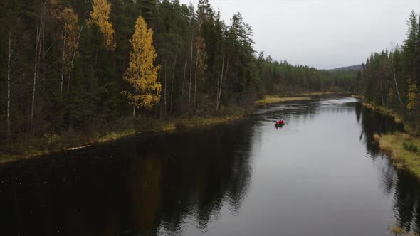 A DRONE FOOTAGE OF A CANOE DURING AUTUMN