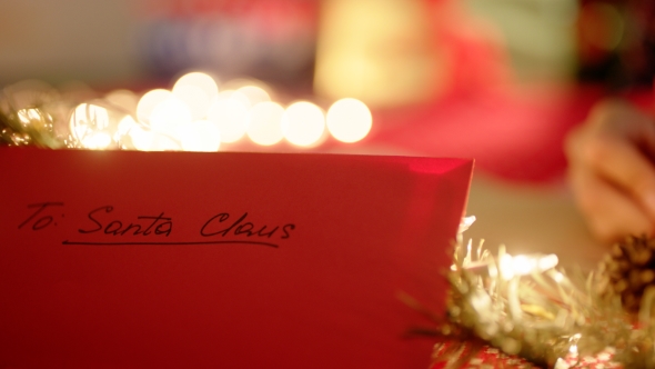 Writing a Letter To Santa Claus on Christmas Eve