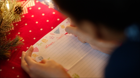 Girl Writing a Letter To Santa Claus 