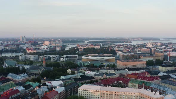 Rising aerial Helsinki Finland colorful dusk warm and cold