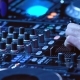 DJ Plays Mix on Controller at a Disco - VideoHive Item for Sale