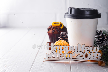 darin surrounded by lettering Happy New Year on white wooden background, copy space