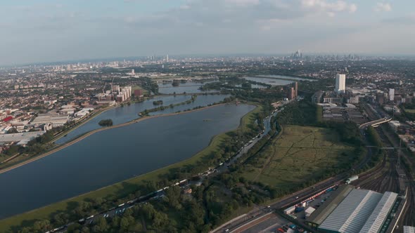 Circling drone shot over north London water reservoirs Walthamstow Tottenham