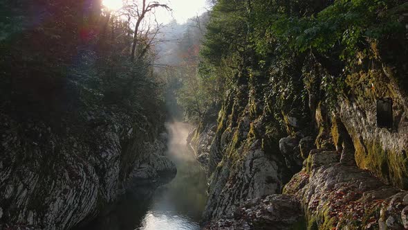 River in a Narrow Canyon with White Rocks