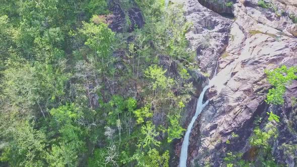 Pictorial High Waterfall TaGu Cascade Runs Among Rocks