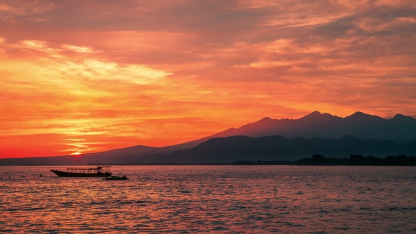 Dawn Above Volcano Rinjani To the Island Lombok with Boat in Indonesia