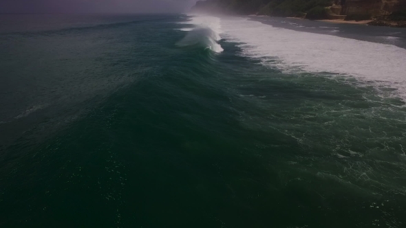 Aerial Drone  Footage of Ocean Waves Breaking Before the Shore Bali, Indonesia