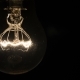 Lamp Turns on in the Dark, Light Bulb Shines Brighter and Brighter - VideoHive Item for Sale