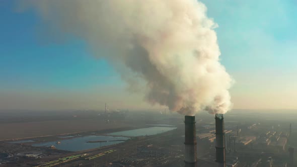 Smoking Factory Chimneys. Environmental Problem of Pollution of Environment and Air in Large Cities