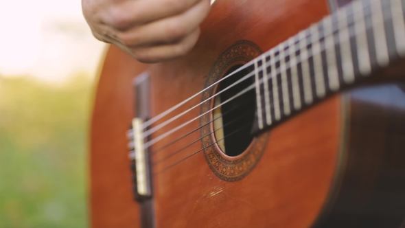 Man Playing Guitar