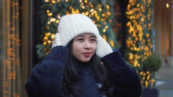 Asian Woman in Europe Street in Winter