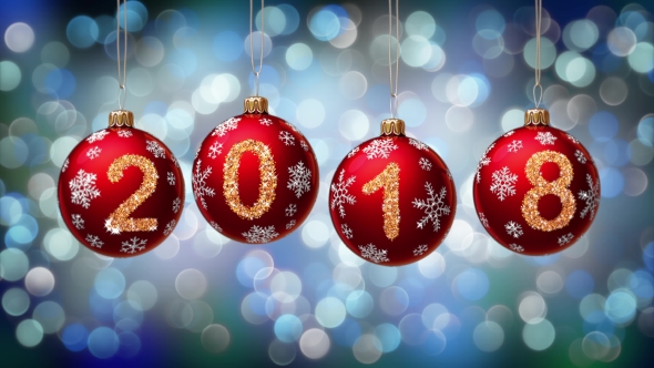 Hanging 2018 Number Glitter Christmas Balls on Blue Bokeh