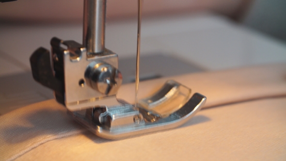 Professional Sewing Machine Stitching with White Thread an Italian Haute Couture Fabric