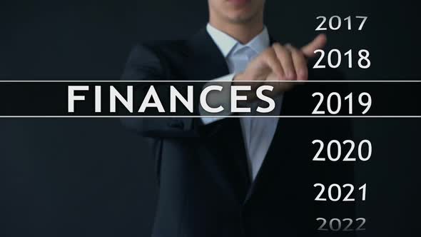 Businessman Selects 2024 Finances Report on Virtual Screen, Money Statistics