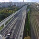 An aerial view of an urban road junction next to the railways - VideoHive Item for Sale