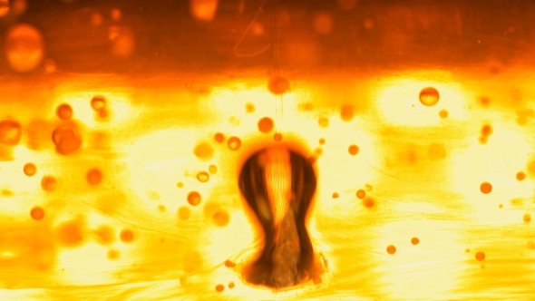 Hot Hot Oil Is a Red Yellow Color,like Boiling Lava,where Bubbles Rise Up