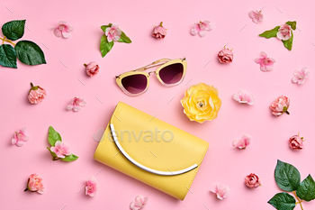 Flat lay. Minimal Style. Trendy fashion Yellow Clutch, Glamour Summer Sunglasses. Roses Flowers. Spring Floral