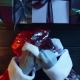 Man in Santa Claus Suit Puts on His Gloves By Wooden Decorated New Year Table, Top Down Shot - VideoHive Item for Sale