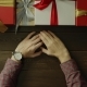 Adult Man with Watch on Hand Sitting By Holiday Wooden Table, Top Down Shot - VideoHive Item for Sale
